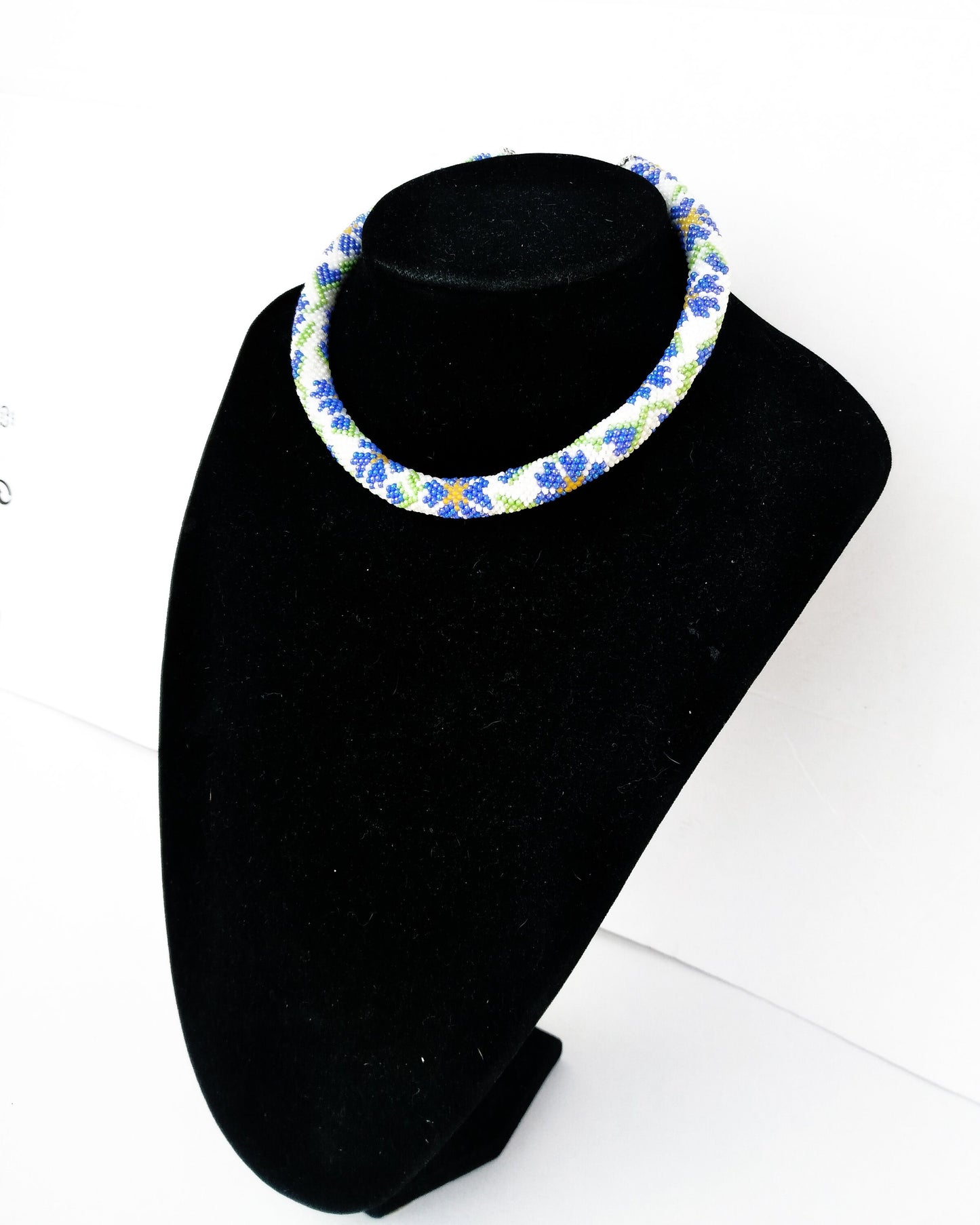 Necklace from beads with wildflowers
