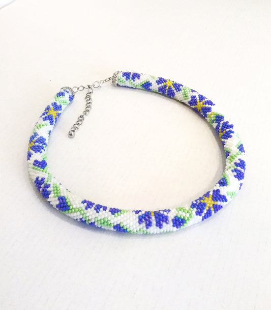 Necklace from beads with wildflowers